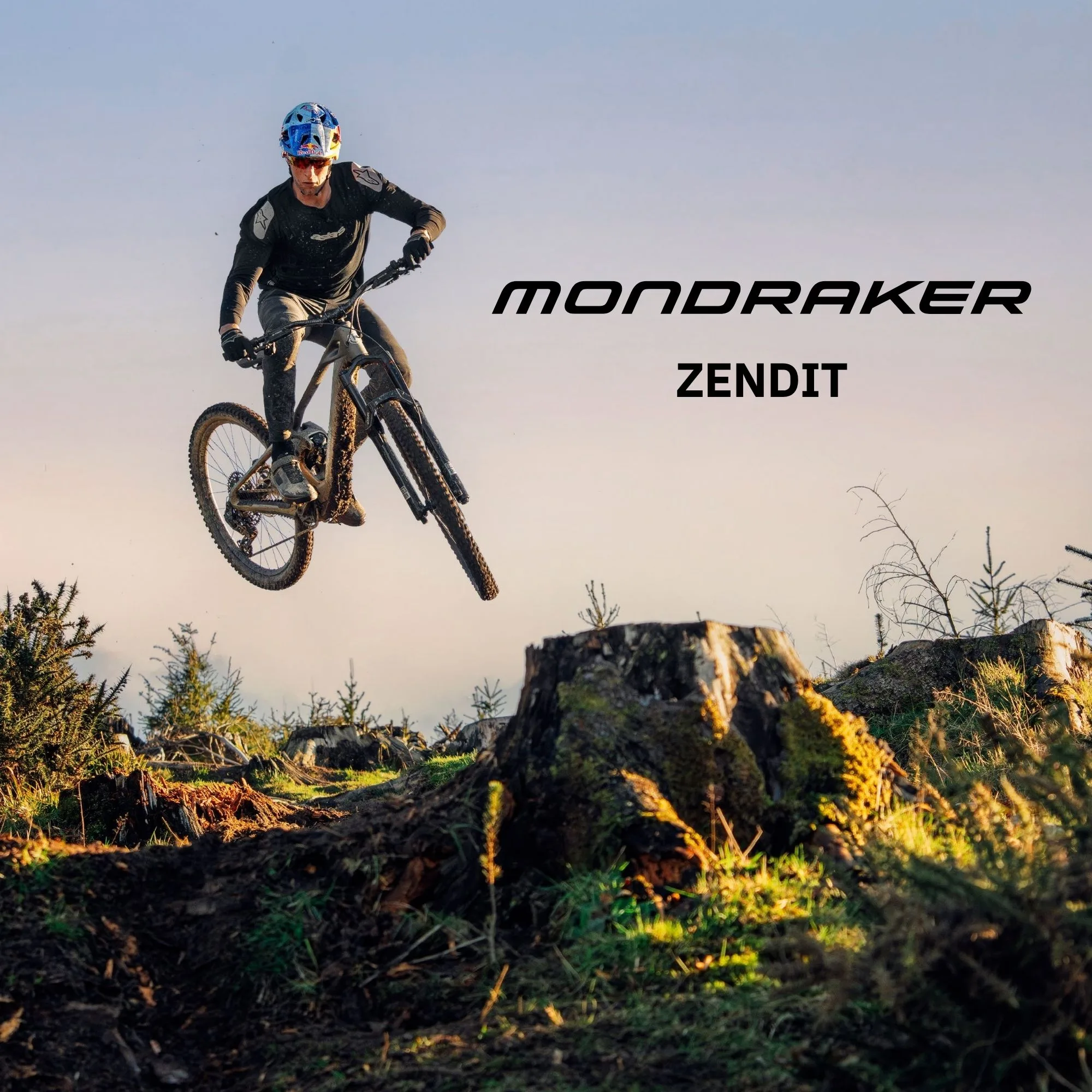 Mountain bike elettrica Mondraker Zendit in salto sopra un costone roccioso